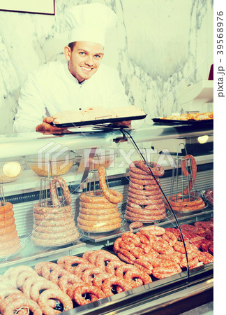 Young cook at butcher store 39568976