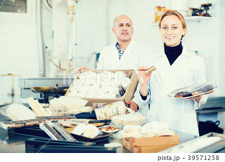 Young female standing in production at factory 39571258