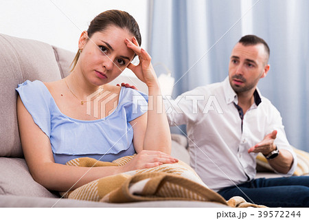 Woman is upset because she quarrel with her husband 39572244