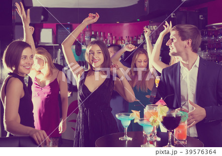 Students dancing on night party Students dancing on night party 39576364