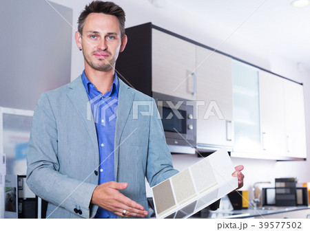 Man offering artificial stone 39577502