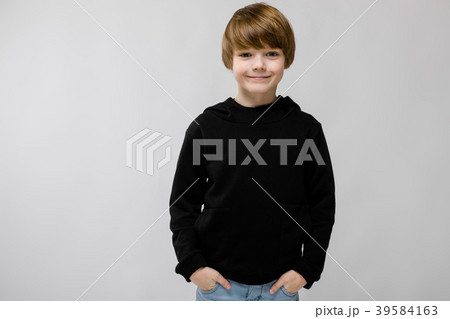 Portrait of adorable smilling little boy standing 39584163