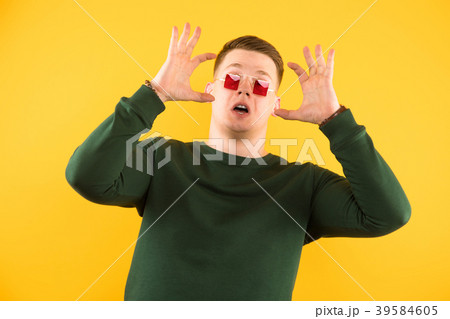 Portrait of young handsome smiling guy with 39584605