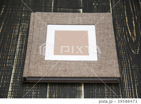 family photo album isolated on wooden background family photo album isolated on wooden background 39586471