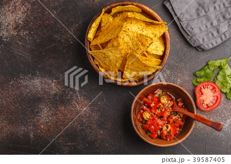 Mexican food concept. Nachos - yellow corn totopos Mexican food concept. Nachos - yellow corn totopos 39587405