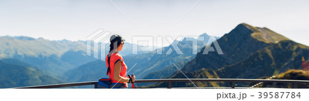 Photo of sports girl with walking sticks Photo of sports girl with walking sticks 39587784