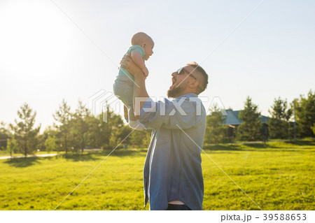 Father and child playing on field nature 39588653