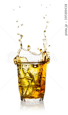 Splash in a glass of whiskey Splash in a glass of whiskey 39589438