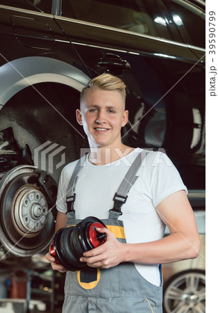 Portrait of a confident young auto mechanic Portrait of a confident young auto mechanic 39590799