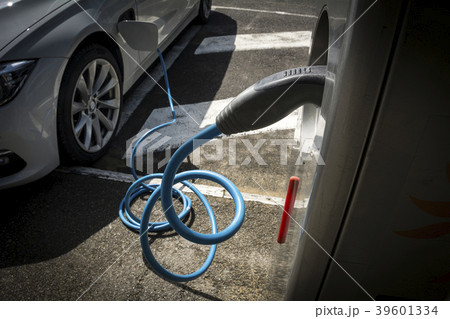 Electric car charging station topping up car batte Electric car charging station topping up car batte 39601334