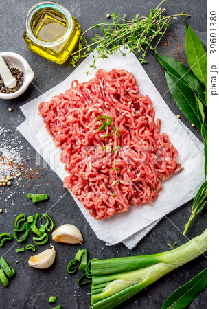 Mince. Ground meat with ingredients for cooking on Mince. Ground meat with ingredients for cooking on 39601380