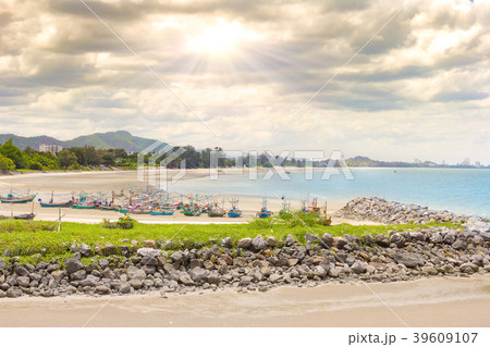Group Coastal fishing boats with breakwater stones 39609107