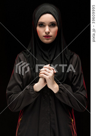 Beautiful young muslim woman wearing black hijab 39609995
