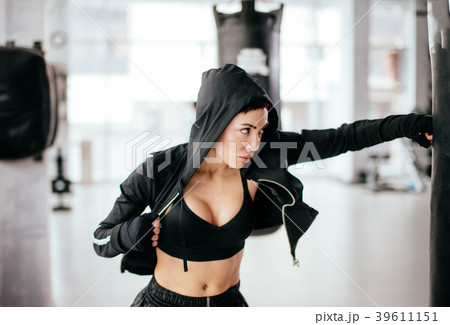 agressive female training high kicks on punching 39611151