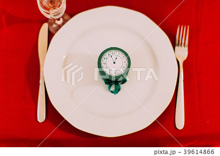 Little vintage clock on the plate close up. Re Little vintage clock on the plate close up. Re 39614866