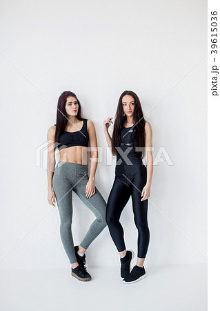 Full-length view of two young beautiful athletic 39615036
