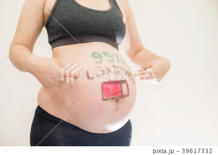 Pregnant with loading painted on belly Pregnant with loading painted on belly 39617332