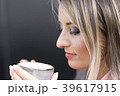woman drinking coffee in the morning at restaurant 39617915