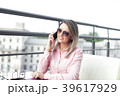 business concept - businesswoman talking on the 39617929