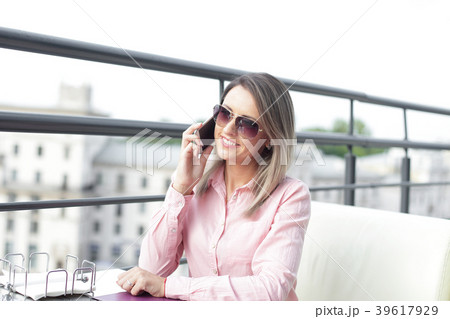 business concept - businesswoman talking on the business concept - businesswoman talking on the 39617929