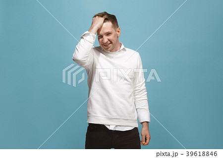 The happy business man standing and smiling 39618846