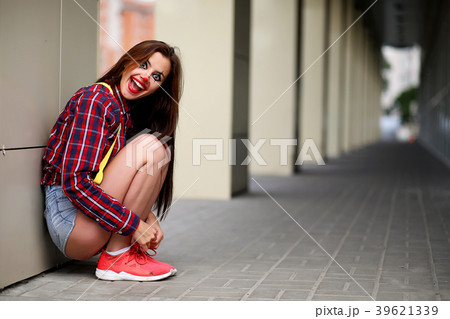 Cute girl in a clown makeup Cute girl in a clown makeup 39621339