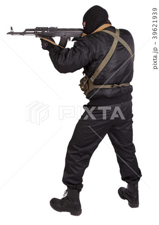 terrorist in black uniform and mask with kalashnikov isolated 39621939