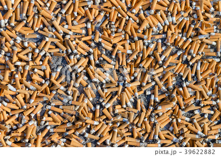 Garbage from large number of cigarette butts Garbage from large number of cigarette butts 39622882