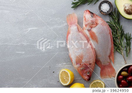 Raw red tilapia fish cooking 39624950