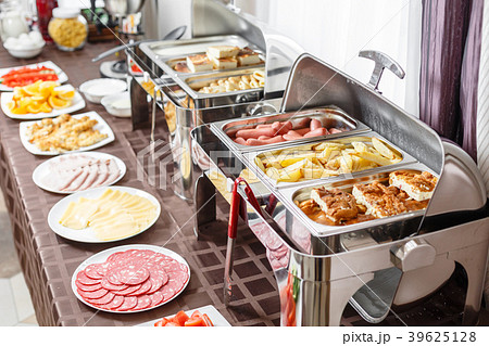 Buffet trays heated ready for service. Breakfast Buffet trays heated ready for service. Breakfast 39625128