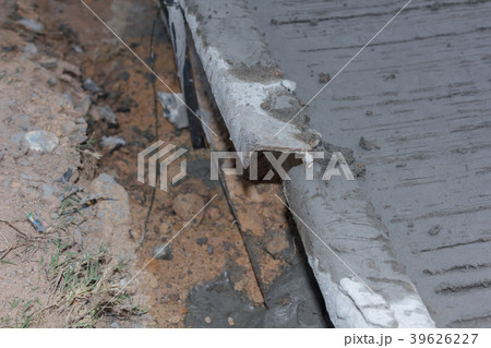 Concrete road under construction. 39626227