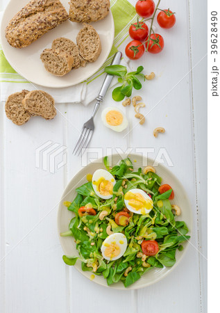 Lamb's lettuce salad with eggs and nuts 39628490
