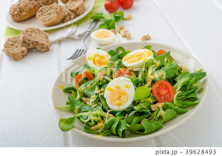 Lamb's lettuce salad with eggs and nuts Lamb's lettuce salad with eggs and nuts 39628493