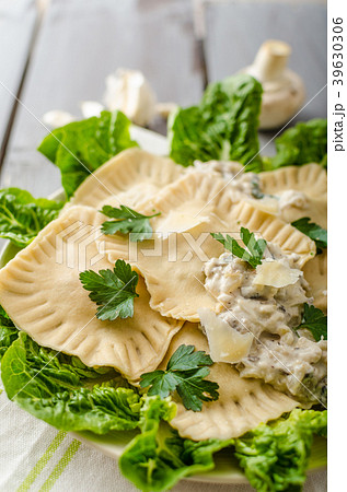 Ravioli stuffed with mushrooms and ricotta 39630306