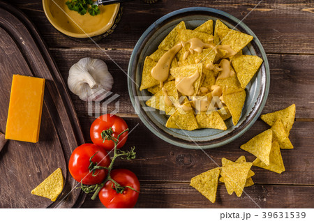 Nachos with homemade cheese dip Nachos with homemade cheese dip 39631539