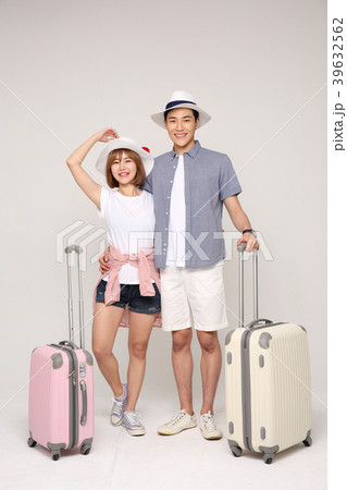 Happy young traveler couple concept photo. set out on a trip to honeymoon, camping and summer vacation concept isolated on white background. 415 39632562