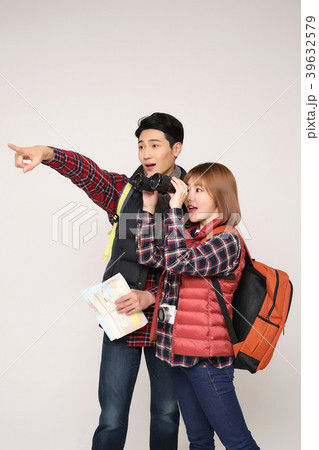 Happy young traveler couple concept photo. set out on a trip to honeymoon, camping and summer vacation concept isolated on white background. 395 39632579
