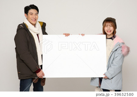 Happy young traveler couple concept photo. set out on a trip to honeymoon, camping and summer vacation concept isolated on white background. 355 Happy young traveler couple concept photo. set out on a trip to honeymoon, camping and summer vacation concept isolated on white background. 355 39632580