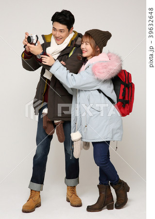 Happy young traveler couple concept photo. set out on a trip to honeymoon, camping and summer vacation concept isolated on white background. 302 Happy young traveler couple concept photo. set out on a trip to honeymoon, camping and summer vacation concept isolated on white background. 302 39632648