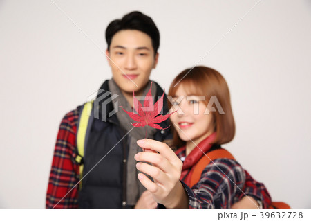Happy young traveler couple concept photo. set out on a trip to honeymoon, camping and summer vacation concept isolated on white background. 388 Happy young traveler couple concept photo. set out on a trip to honeymoon, camping and summer vacation concept isolated on white background. 388 39632728
