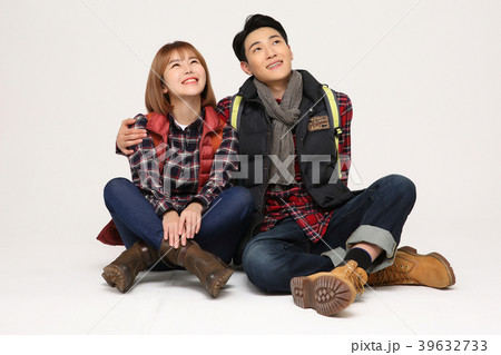 Happy young traveler couple concept photo. set out on a trip to honeymoon, camping and summer vacation concept isolated on white background. 377 39632733