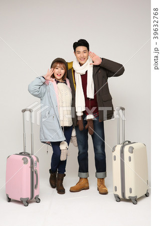 Happy young traveler couple concept photo. set out on a trip to honeymoon, camping and summer vacation concept isolated on white background. 328 Happy young traveler couple concept photo. set out on a trip to honeymoon, camping and summer vacation concept isolated on white background. 328 39632768