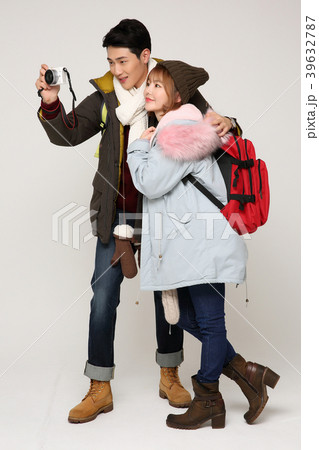 Happy young traveler couple concept photo. set out on a trip to honeymoon, camping and summer vacation concept isolated on white background. 304 39632787