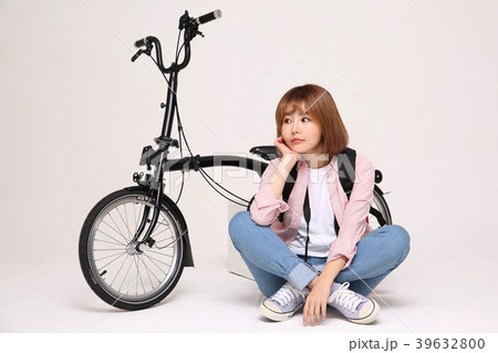 Young traveler woman with a backpack concept isolated on White photo. 145 Young traveler woman with a backpack concept isolated on White photo. 145 39632800