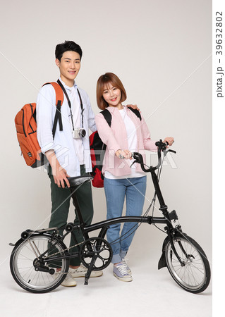 Happy young traveler couple concept photo. set out on a trip to honeymoon, camping and summer vacation concept isolated on white background. 225 39632802