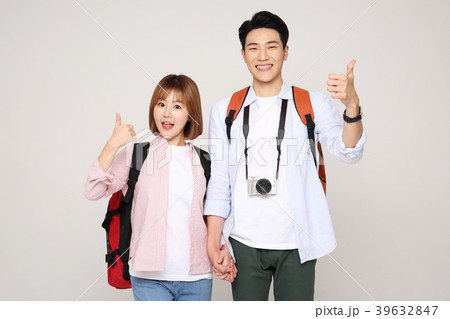 Happy young traveler couple concept photo. set out on a trip to honeymoon, camping and summer vacation concept isolated on white background. 178 39632847