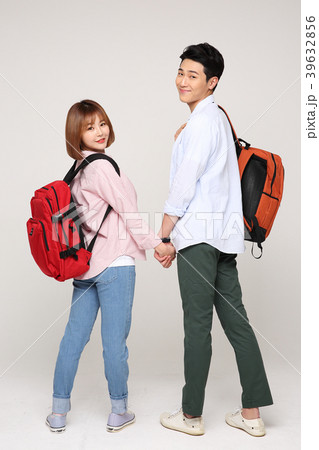 Happy young traveler couple concept photo. set out on a trip to honeymoon, camping and summer vacation concept isolated on white background. 162 39632856