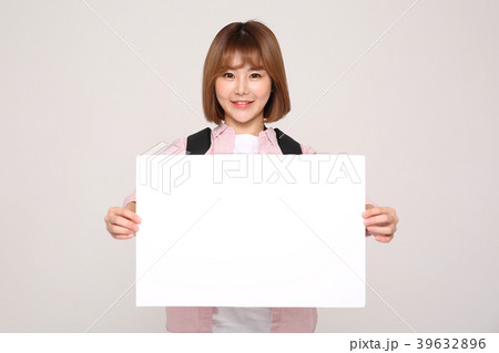Young traveler woman with a backpack concept isolated on White photo. 132 Young traveler woman with a backpack concept isolated on White photo. 132 39632896