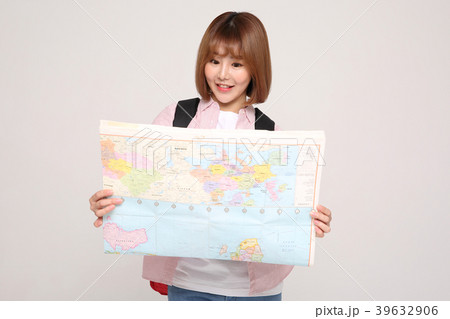 Young traveler woman with a backpack concept isolated on White photo. 121 39632906