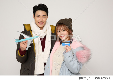 Happy young traveler couple concept photo. set out on a trip to honeymoon, camping and summer vacation concept isolated on white background. 345 39632954